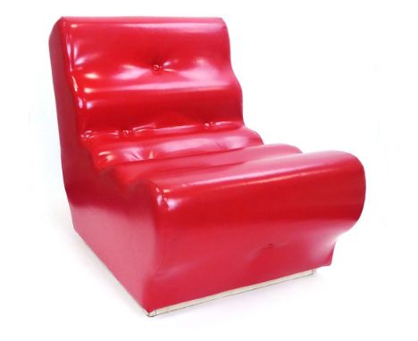 A pair of 1960's red vinyl and button upholstered low chairs on white plinth bases