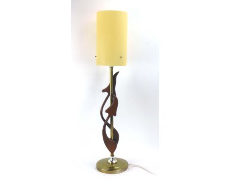 A 1960's sculptural table lamp, the brass shaft entwined with a pair of teak mushroom, with a spun perspex shade and a brass 