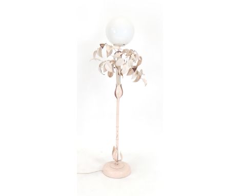 A pale pink standard lamp in the form of a tree with formed branches and leaves surmounted by an opal white glass shade of sp