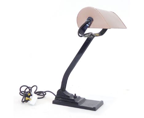 A 1950's banker's lamp with a copper coloured shade on a cast metal base, by Erpe, Belgium, No. 52