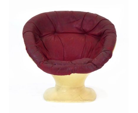 A 1970's lounge chair, the plastic shell with red button upholstery CONDITION REPORT: Poor. Requires reupholstery