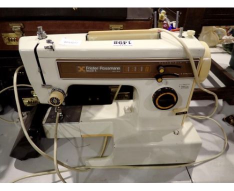 Frister and Rossman Bearer four sewing machine with foot pedal. All electrical items in this lot have been PAT tested for saf