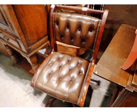 Button upholstered swivel leather chair. Not available for in-house P&amp;P 