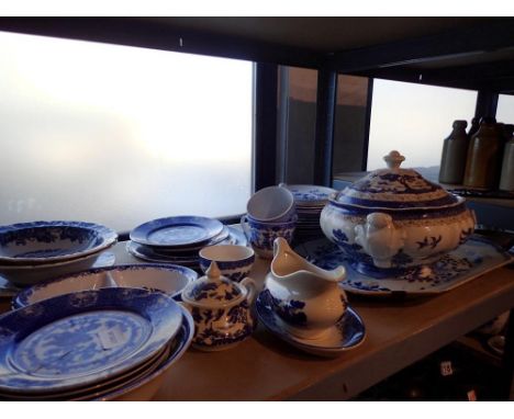 Shelf of mixed blue and white ceramics. Not available for in-house P&amp;P 