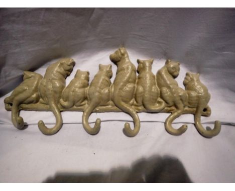 Cast iron Cat Tail coat hook, W: 30 cm. UK P&amp;P Group 1 (£16+VAT for the first lot and £2+VAT for subsequent lots) 