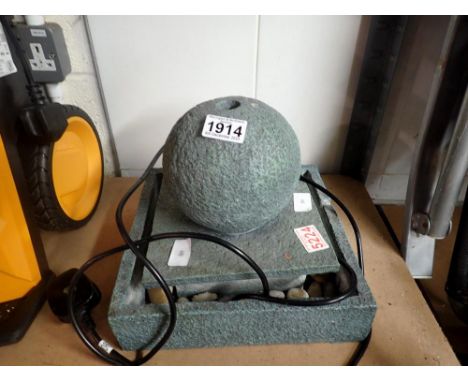 Electric water feature. All electrical items in this lot have been PAT tested for safety and have passed. This does not confi