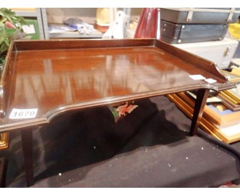 Early 20th century mahogany breakfast tray with folding supports. Not available for in-house P&amp;P 