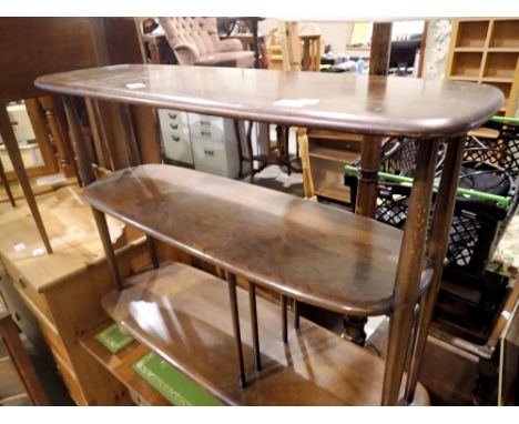 Ercol dark elm console or bookcase on castors, 91 x 32 x 71 cm, good order but surface scratches throughout. Not available fo