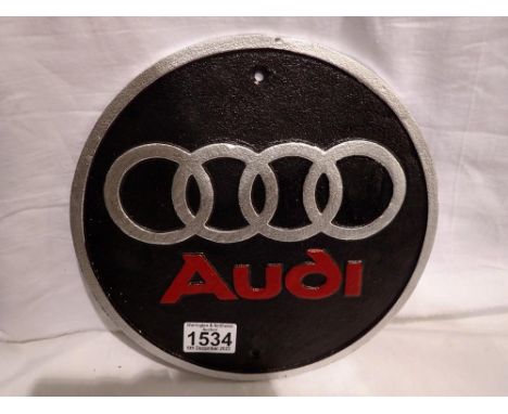 Cast iron circular Audi plaque, D: 25 cm. UK P&amp;P Group 1 (£16+VAT for the first lot and £2+VAT for subsequent lots) 