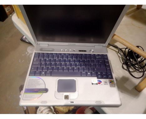 Samsung laptop and charger with Windows XP. All electrical items in this lot have been PAT tested for safety and have passed.