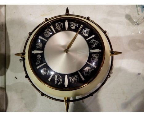 A Metamec Zodiac clock, D: 30 cm. Not available for in-house P&amp;P 