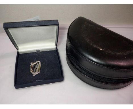 Hallmarked silver Irish harp brooch and a travelling jewellery box. P&amp;P Group 1 (£16+VAT for the first lot and £2+VAT for