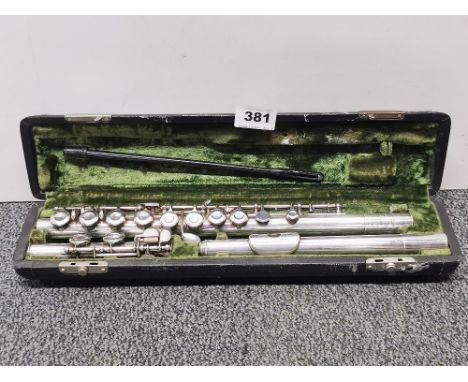 A cased silver plated flute, by Gebruder Monnig.