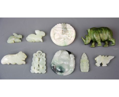 A group of Chinese carved jade and other hardstone items.