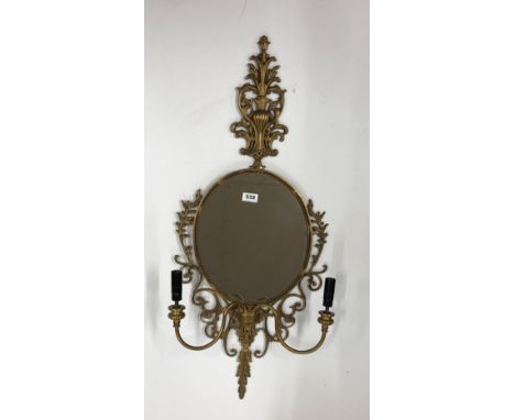 A brass mirror wall light, H. 94cm.