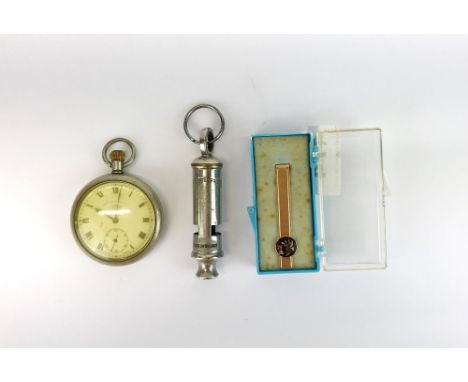 A ruby set vintage tie pin, together with a pocket watch and police whistle.