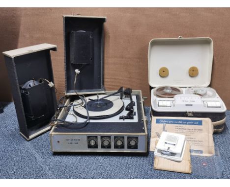 Two vintage reel to reel tape recorders, one Grundig, the other unbranded.