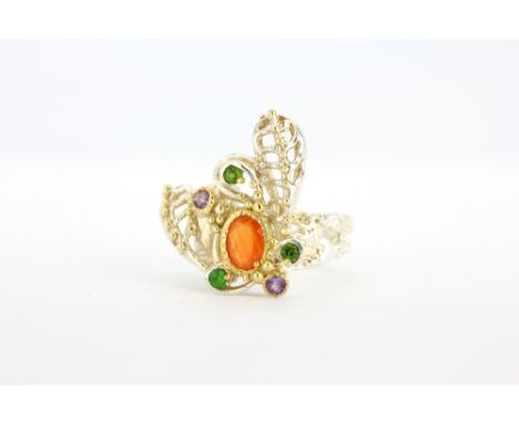 A 925 silver ring set with an oval cut fire opal, amethyst and citrines, (Q).