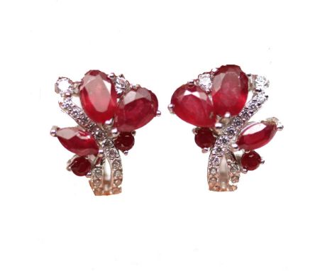 A pair of 925 silver earrings set with pear cut rubies and white stones, L. 1.5cm.