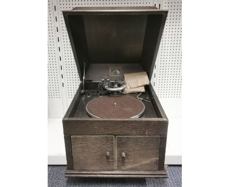 An early gramophone record player.