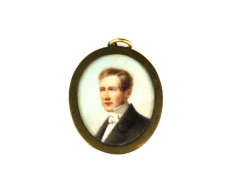 A 19th century hand painted portrait miniature of a young gentleman, L. 5cm.