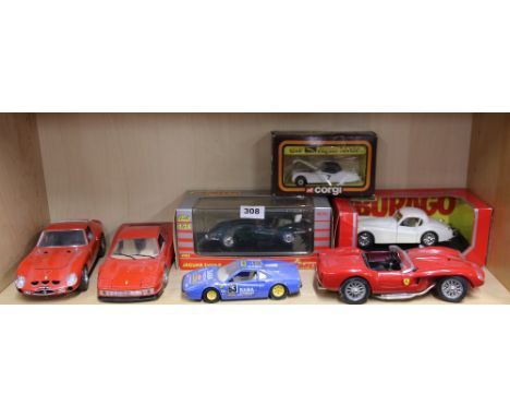 A group of mixed large scale die cast model vehicles.