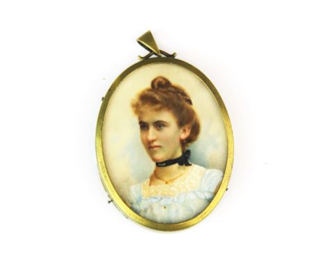 A framed hand painted portrait miniature of a young woman, L. 6cm.
