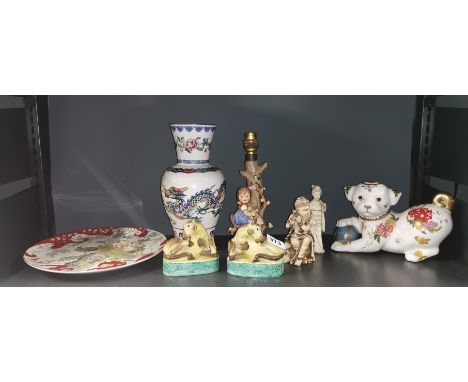 A pair of Chinese porcelain horse figures, together with a Hummell table lamp and other items.