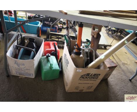 Two boxes containing plastic garden sprayers; garden sprinkler; hand saw; spirit level; extension reel; external light and tw