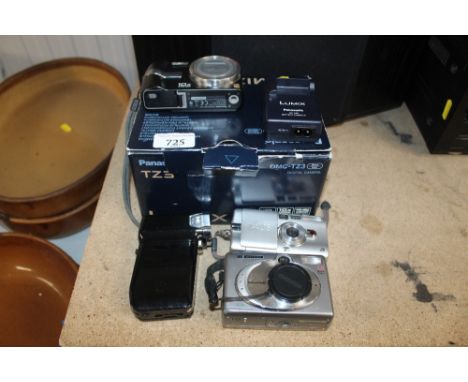A Panasonic Lumix digital camera; hand held HD camera and two other digital cameras