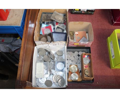 Four boxes containing various coinage including Crowns; Churchill Crowns; 1951 5 Shilling; Zippo lighter; medallions etc