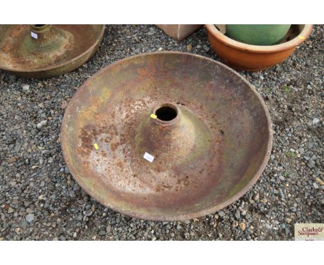 A circular cast iron pig trough AF, approx. 29' diameter