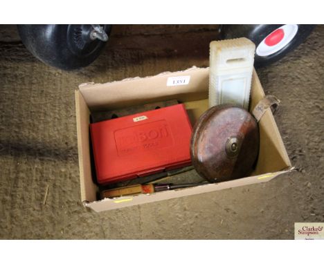 A small box containing vintage tape measure; pliers; a Rolson 38 piece number and letter stamping set; files etc