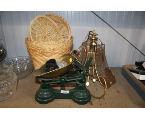 A set of scales and weights; a collection of basket ware and a ceiling light