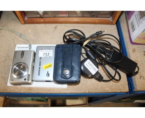 A Fuji Film Fine Pix digital camera and a universal card reader