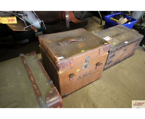 A leather and canvas travelling trunk 