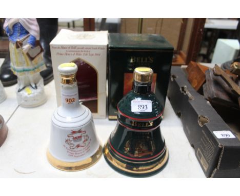 A Wade Bells Scotch whiskey decanter and contents and a Bells Royal Commemorative decanter and contents