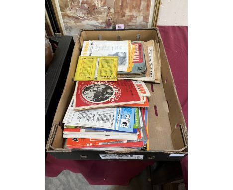 A box of football programmes