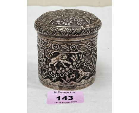 An Indian silver jar and cover, repousse decorated with animals, figures and foliage.  3¼" high. 3ozs 14dwts