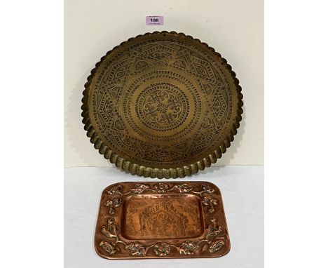 A copper Newlyn style tray, 11¼" wide and an Islamic brass circular tray, 14¾" diam.