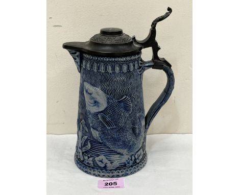 A 19th century German salt glazed stoneware stein jug with pewter lid, moulded with fish and aquatic plants. 9" high