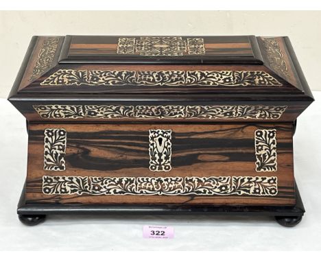 A William IV coromandel and mother-of-pearl inlaid sarcophagus tea caddy. 14" wide