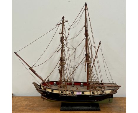 A scratch built wood model of a fourteen gun brig. Length of hull 26"