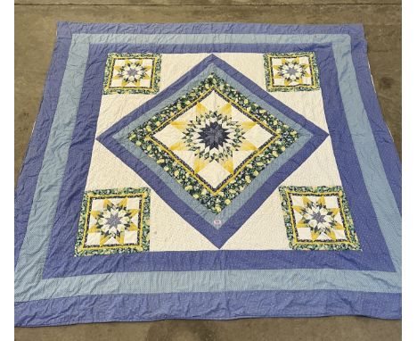 A bed quilt 88" x 90"