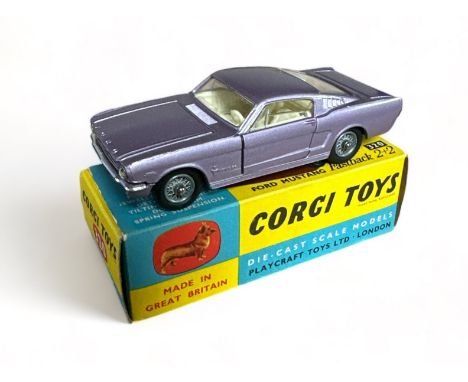 Corgi Ford Mustang Fastback 2+2 No. 320, generally excellent in excellent to good plus blue and yellow box, with metallic lil