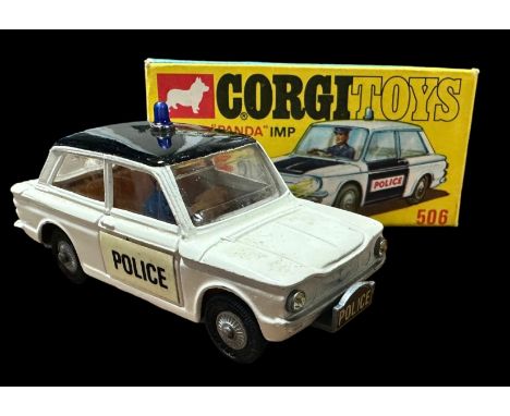 Corgi Police Panda Imp black roof/luminous door panel No. 506, generally excellent in excellent to good plus box including pa