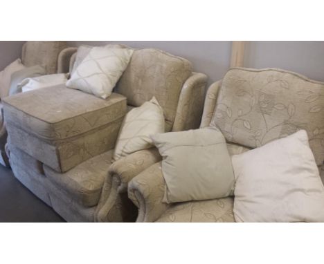 A 3 seater suite and pouffe
