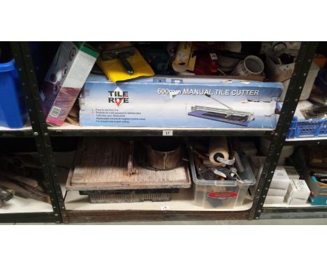 2 Shelves Of Decorating Items Inc. Tile Cutters etc.