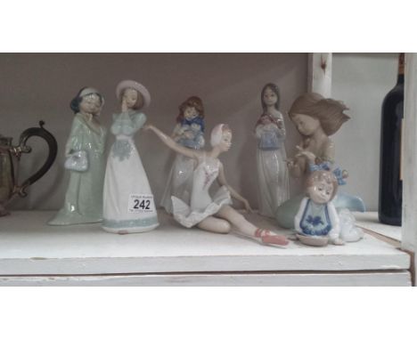 A Lladro ballerina and 6 NAO figurines including large mermaid