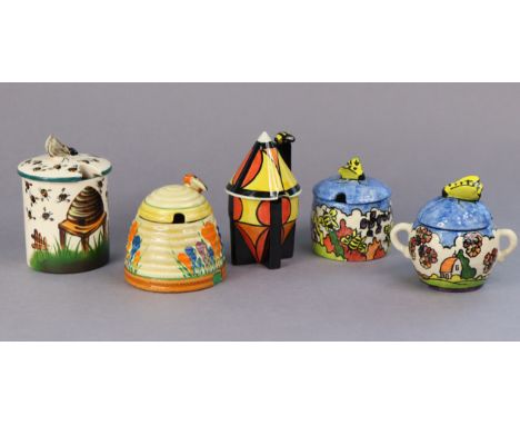 A Clarice Cliff Bizarre “crocus” preserve pot, 4” high (restored), a Wemyss pottery honey pot, 5” high; &amp; three other hon